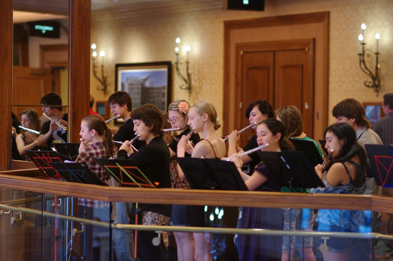 The Flute Performing Ensemble gives an impromptu performance on the balcony