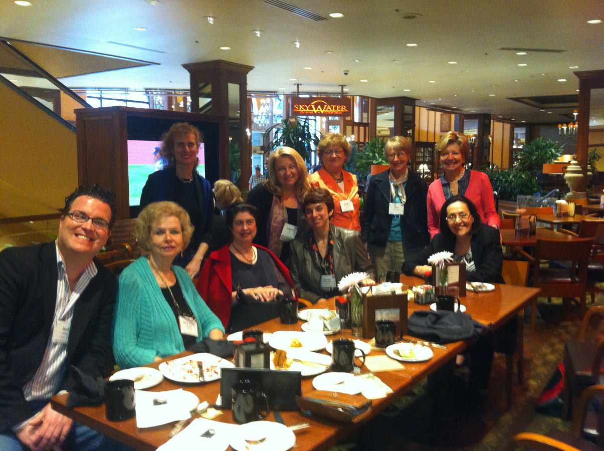 Ann Schein (in red jacket) and her entourage at the Conference