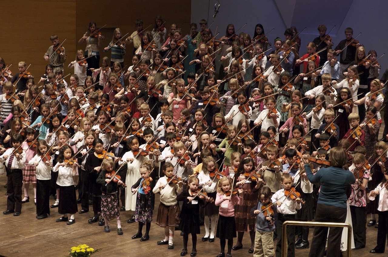 Violin students perform at the Suzuki Association of Minnesota graduation recital.