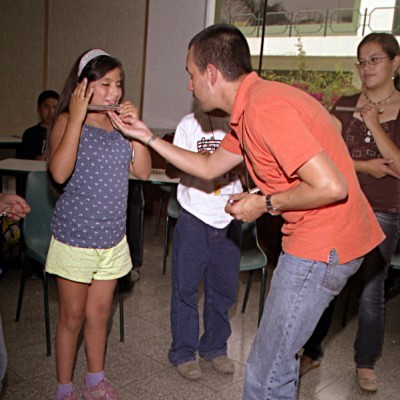 Juan Manuel Acosta and flute student