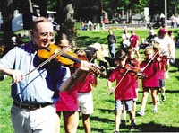 Stan Smith marching to music with students