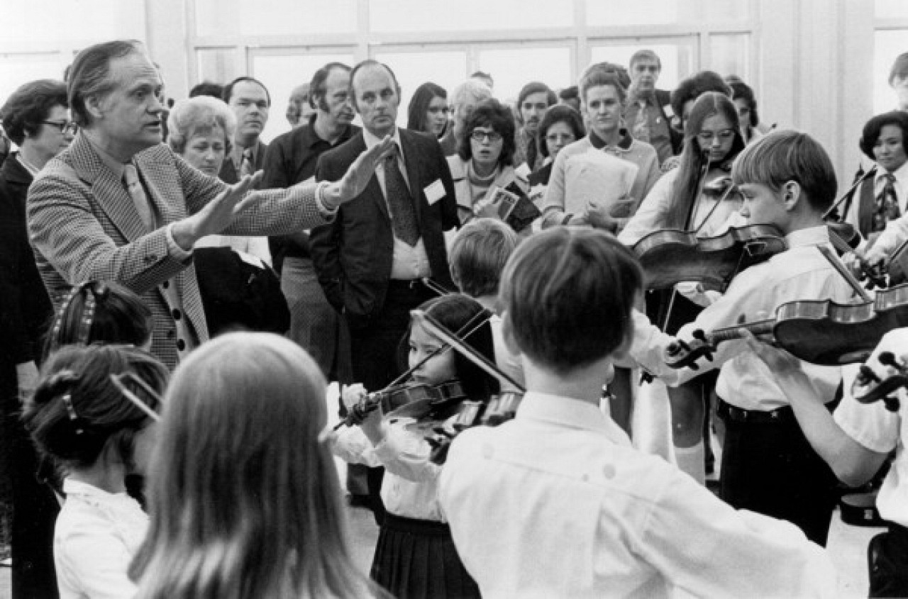 William Starr conducting a student orchestra