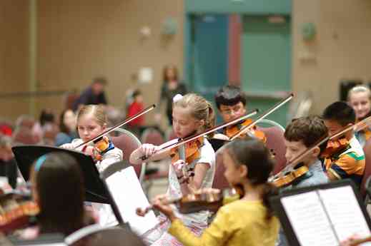 SYOA violinists in rehearsal at the 2012 conference