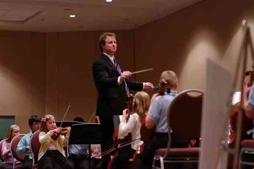 Emmett Drake conducts the SYOA 1 concert at the 2012 conference