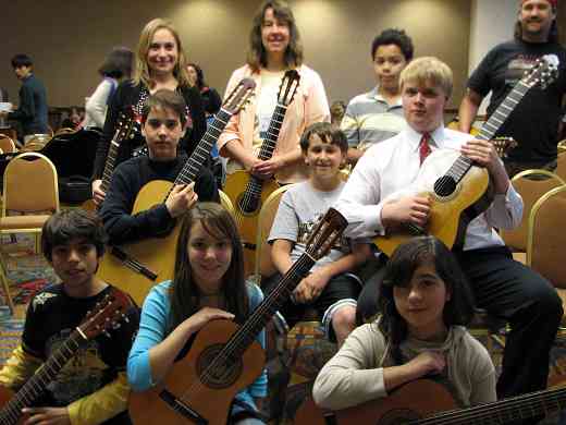 MaryLou Roberts and Suzuki guitar students.