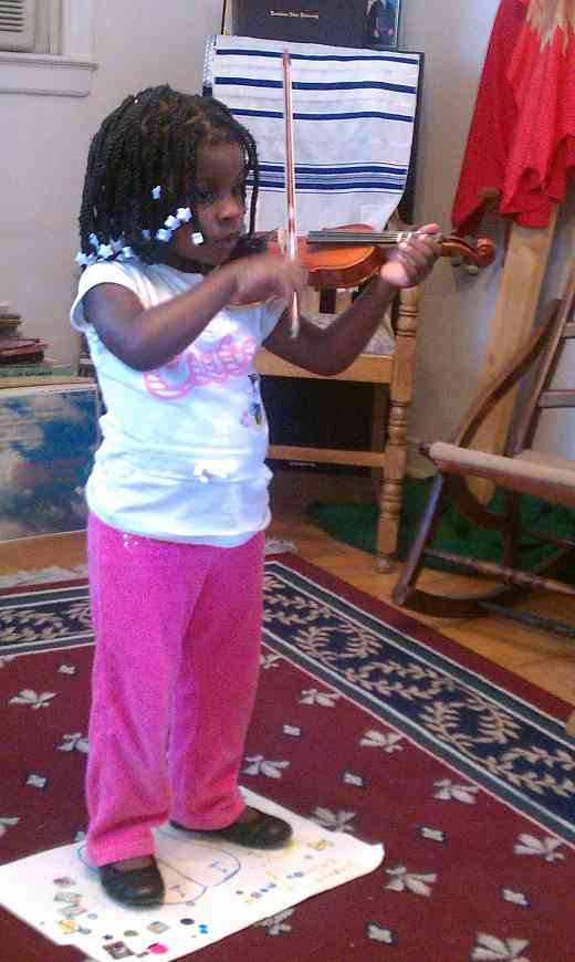 Violin student at Greater New Orleans Summer Suzuki Music Camp