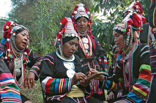 Akha Ulo women, funeral rites, Chiang Rai, Thailand, 2009