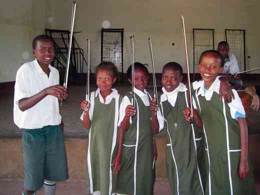 Students display their bow holds on the first day of lessons