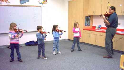 Rigo Murillo with Elementary Class