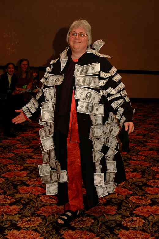 Gilda Barston in the money coat at the 2001 SAA Leadership Retreat.