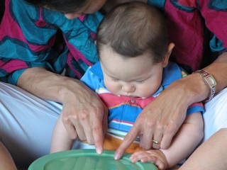 Fascinated with the drum in Early Childhood class at the 2008 SAA Conference