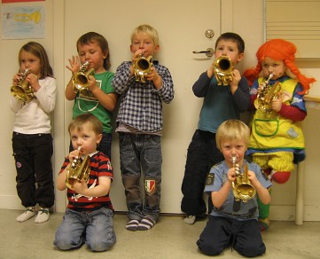 Group of Children Playing Trumpet