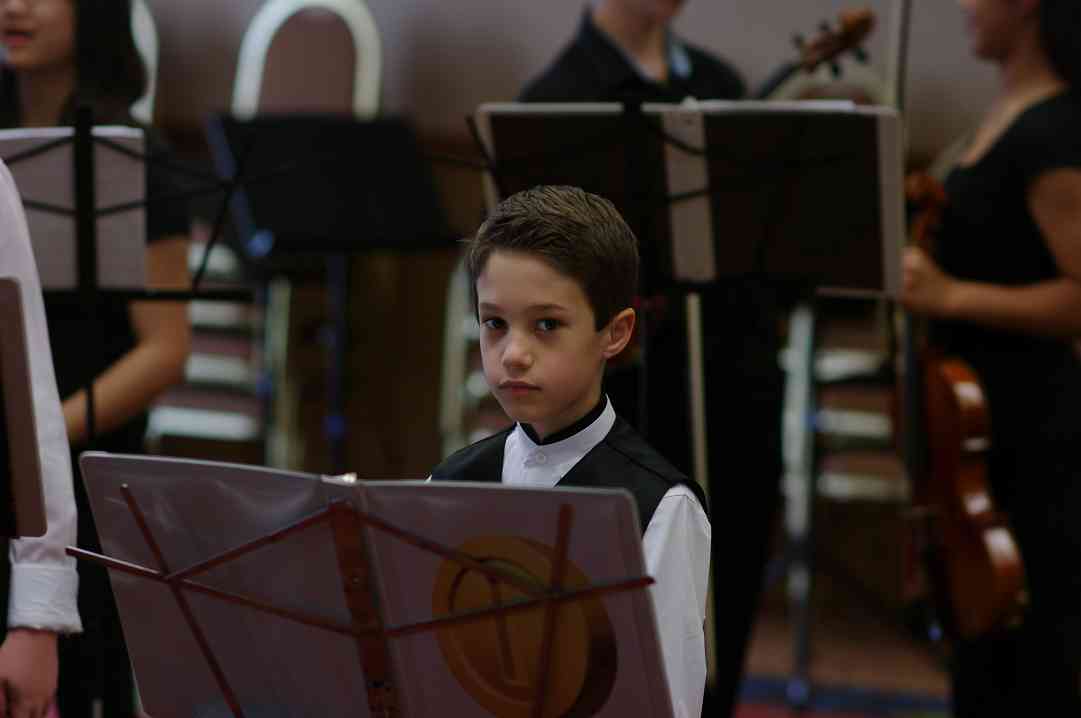 A young member of the Bach viola ensemble at the 2012 Conference