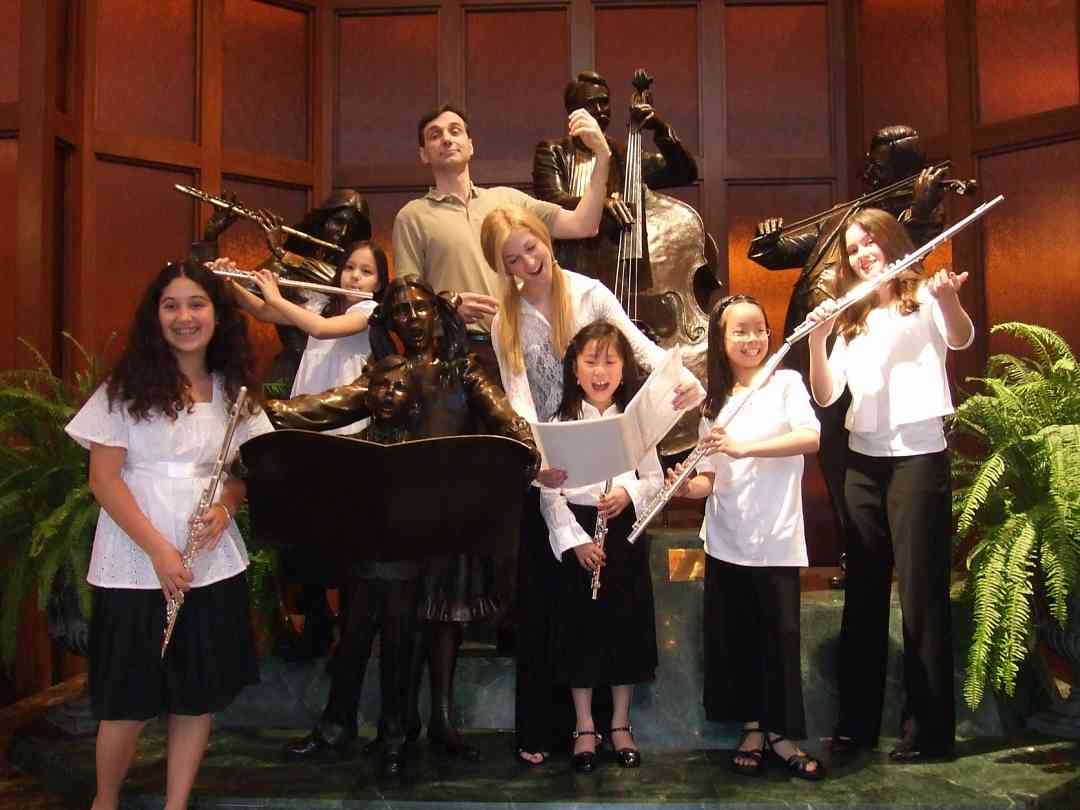 Flute students with the Hilton Hotel lobby statues at the 2008 SAA Conference.