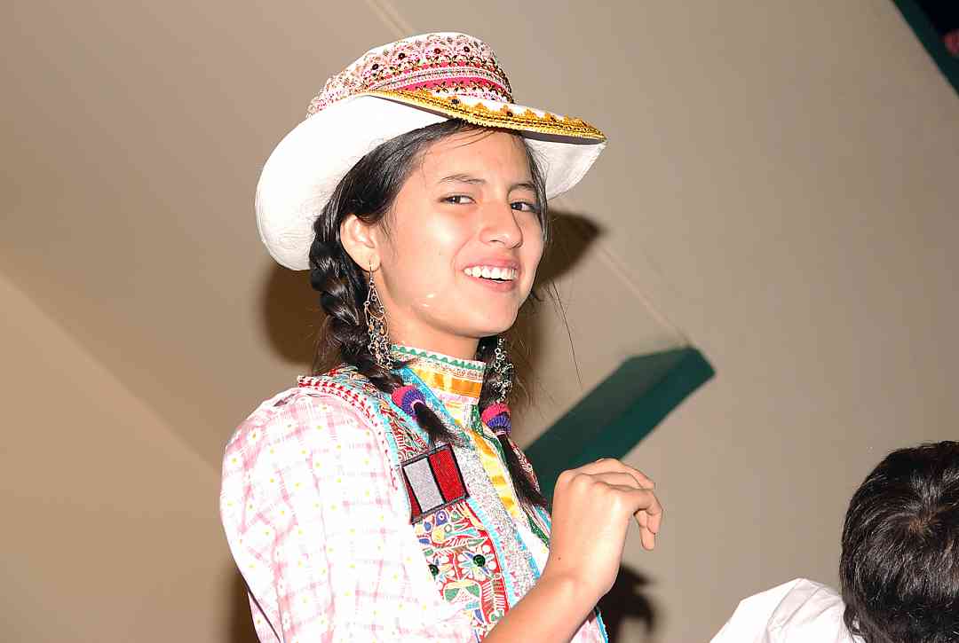 Smiling Milagros, pianist from the South of Peru