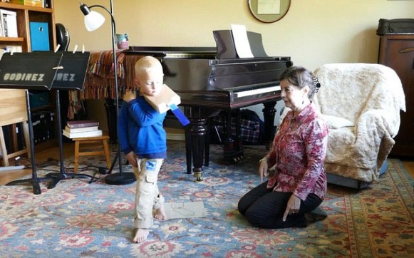 3 Year Old with Box Violin—Canadian