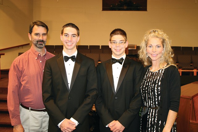 Austin, thurd from left, with his parents, Lynn and Carla, and brother Hunter