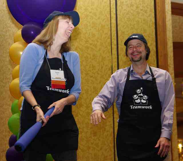 Baseball game at the 2010 Annual General Meeting. Sue Baer and Mark George.